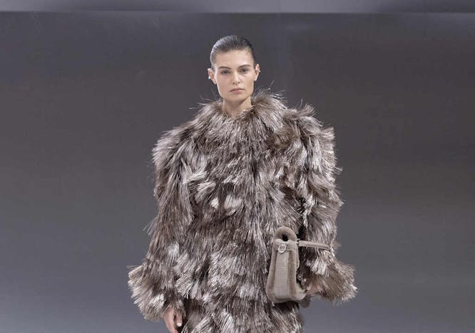 adult female person woman clothing coat fur fashion lady