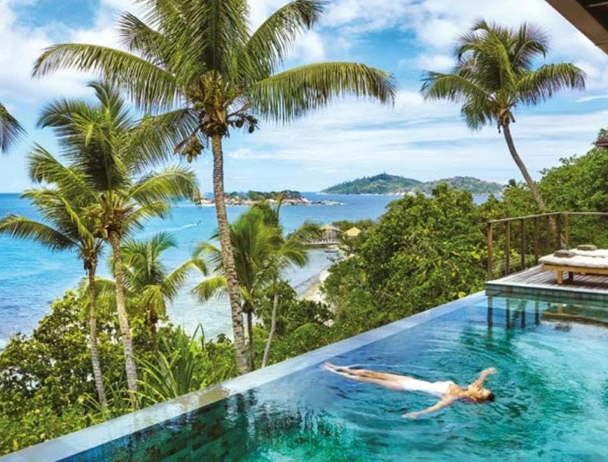 water outdoors nature pool building sea ocean hotel land tropical