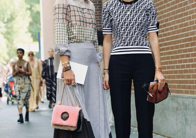 clothing apparel person female woman sunglasses accessories skirt handbag bag