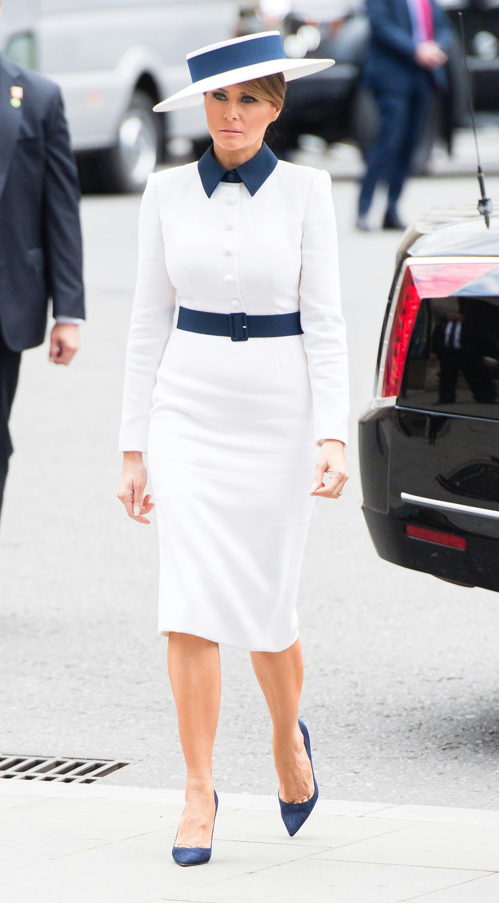 london england clothing person suit overcoat female hat dress woman footwear sleeve
