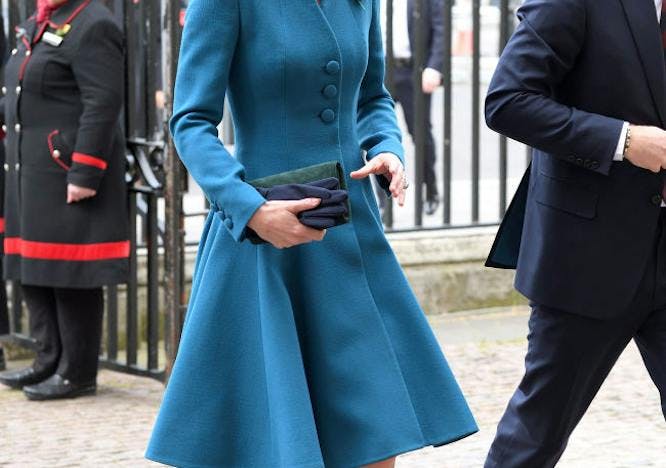 london england clothing shoe suit overcoat coat person female skirt dress woman