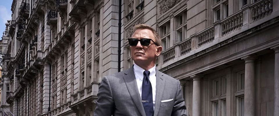clothing apparel suit overcoat coat tie accessories person sunglasses man