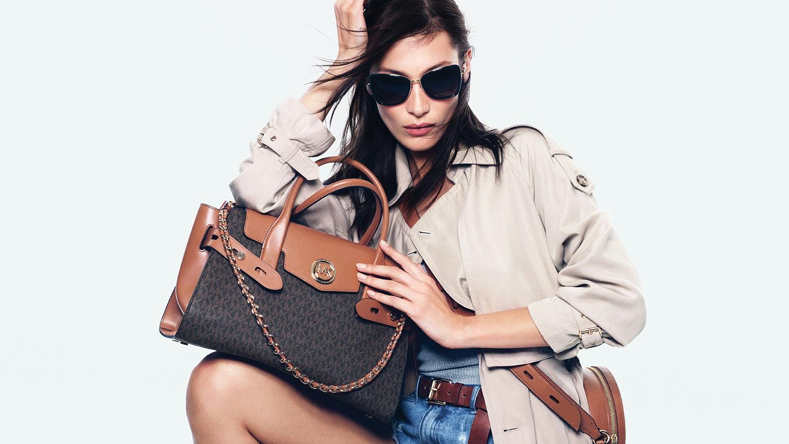 sunglasses accessories accessory handbag bag person human clothing apparel purse