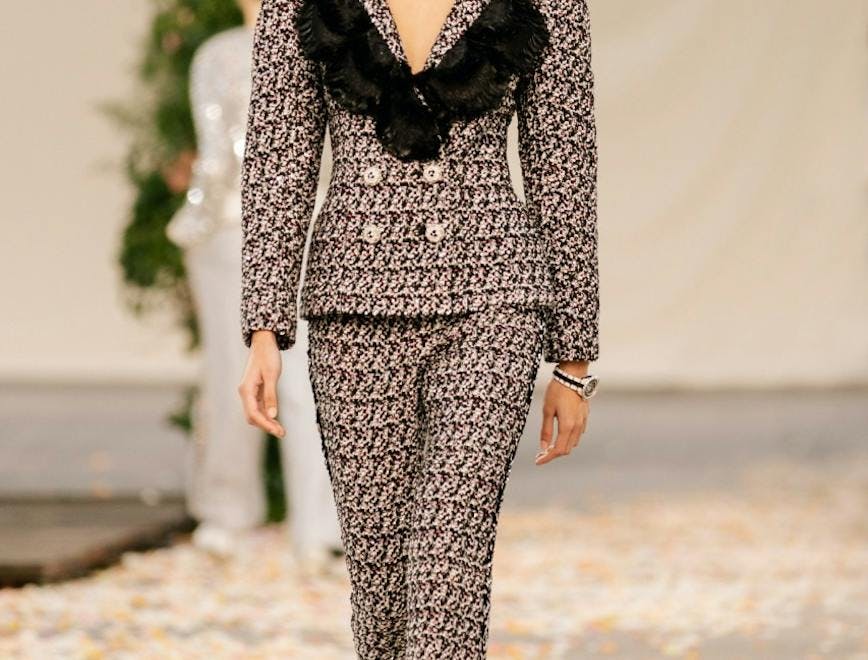 clothing apparel female person dress suit coat overcoat woman runway