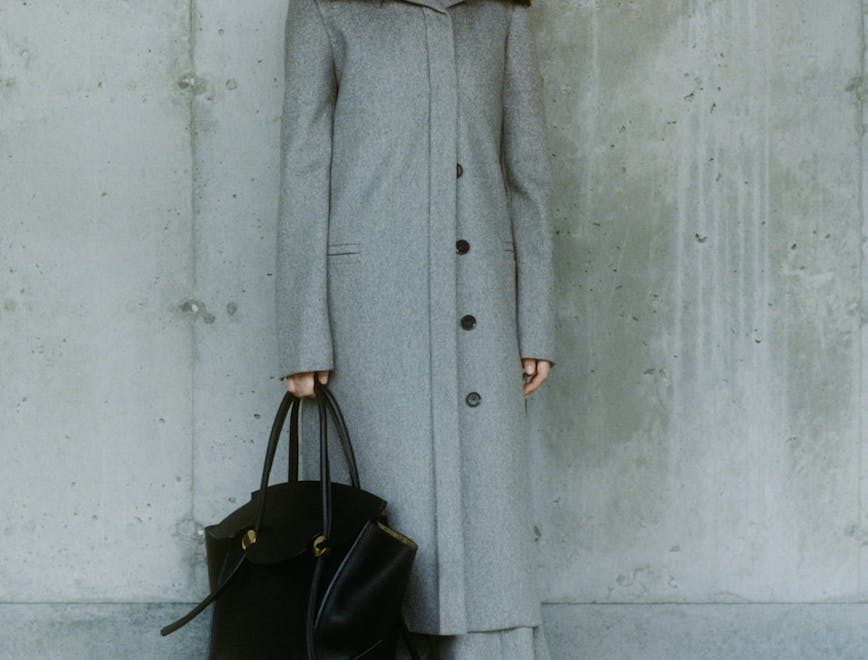 clothing apparel overcoat coat sleeve person human long sleeve