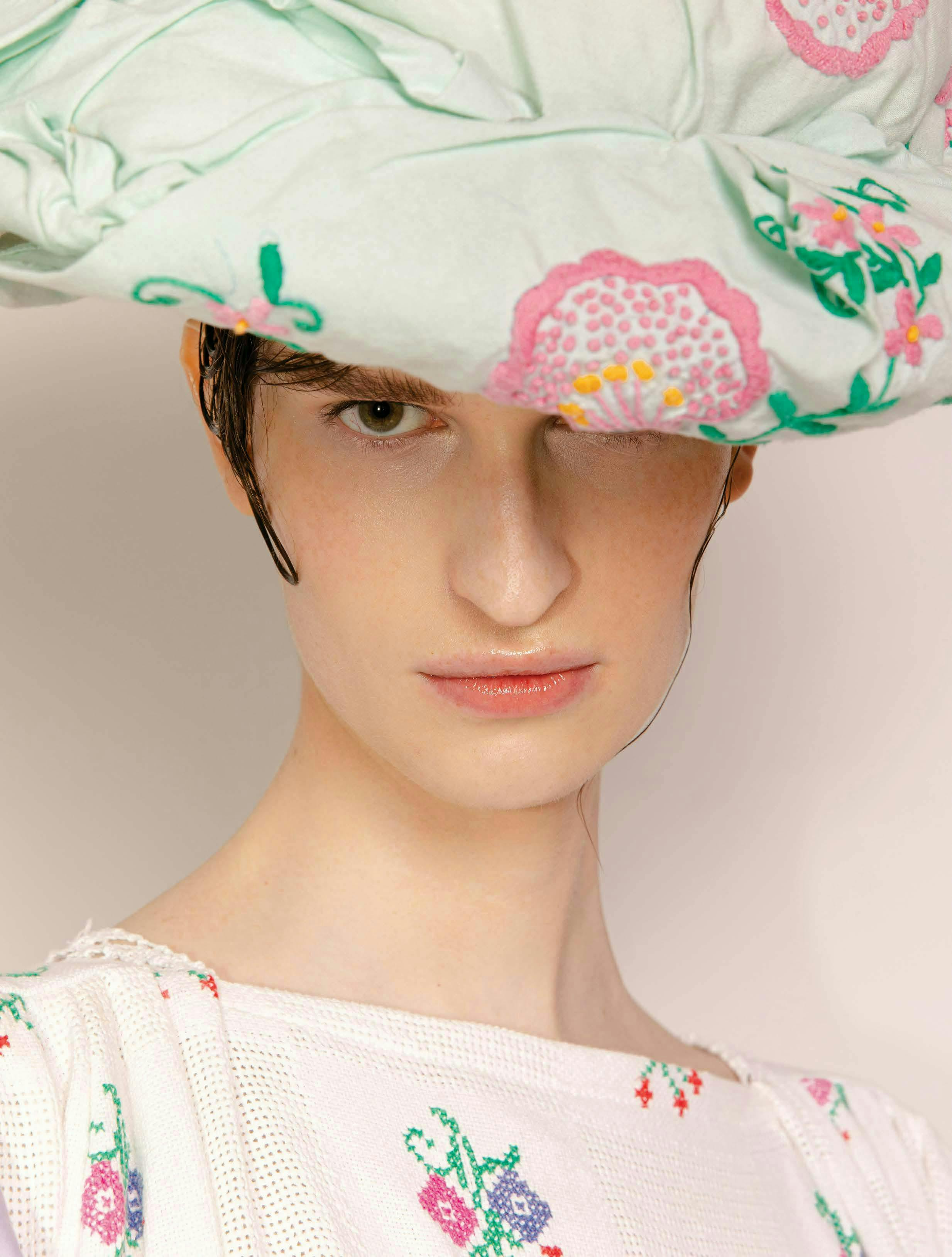 clothing apparel person human sun hat hat