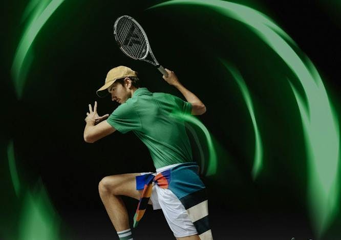 shorts clothing apparel person human tennis sport sports tennis racket racket