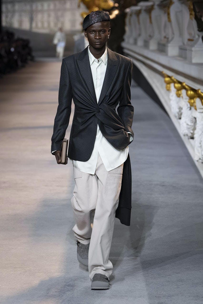 person shoe footwear clothing suit coat overcoat fashion female runway