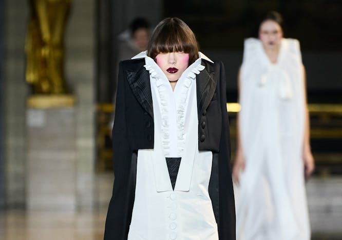 clothing coat person suit overcoat sleeve female runway long sleeve woman
