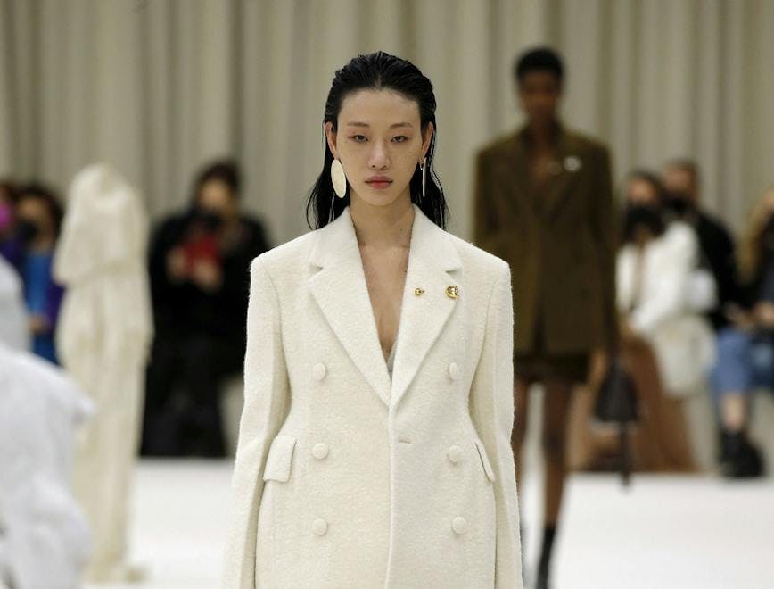 coat clothing apparel person human sleeve runway long sleeve female