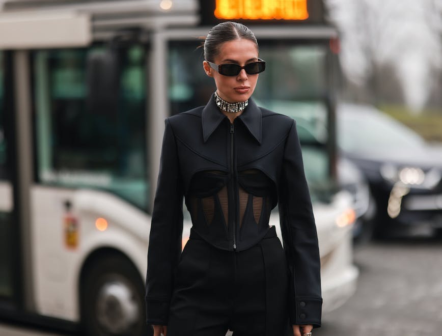 clothing sunglasses accessories person suit overcoat coat car transportation vehicle