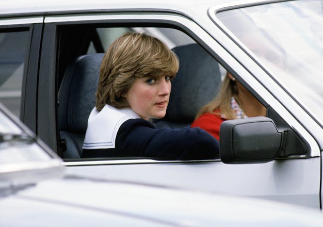 angry british royal family diana princess of wales driving equestrian events equestrian sports eye contact half length half-lengths off duty polo private cars recreation royal transportation royals royalty serious person human car transportation vehicle automobile cushion mirror car mirror