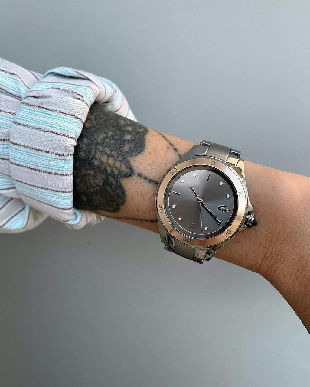 wristwatch wrist hand person human
