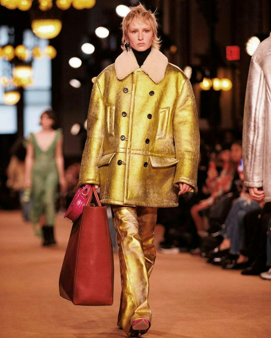 coat clothing lady person handbag man adult male fashion overcoat
