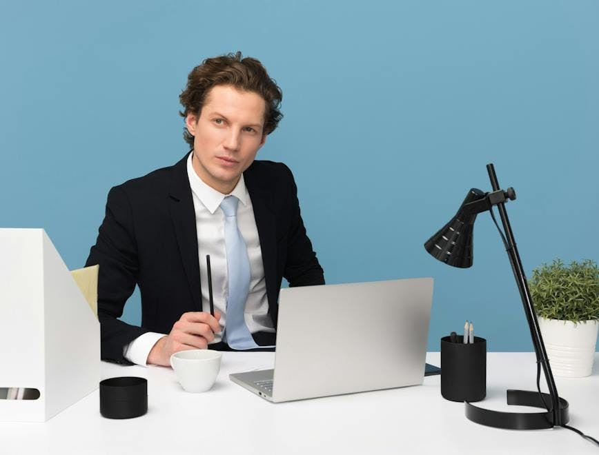 microphone person sitting adult male man laptop pc face table