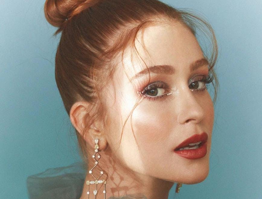 head person face earring jewelry adult female woman portrait lipstick
