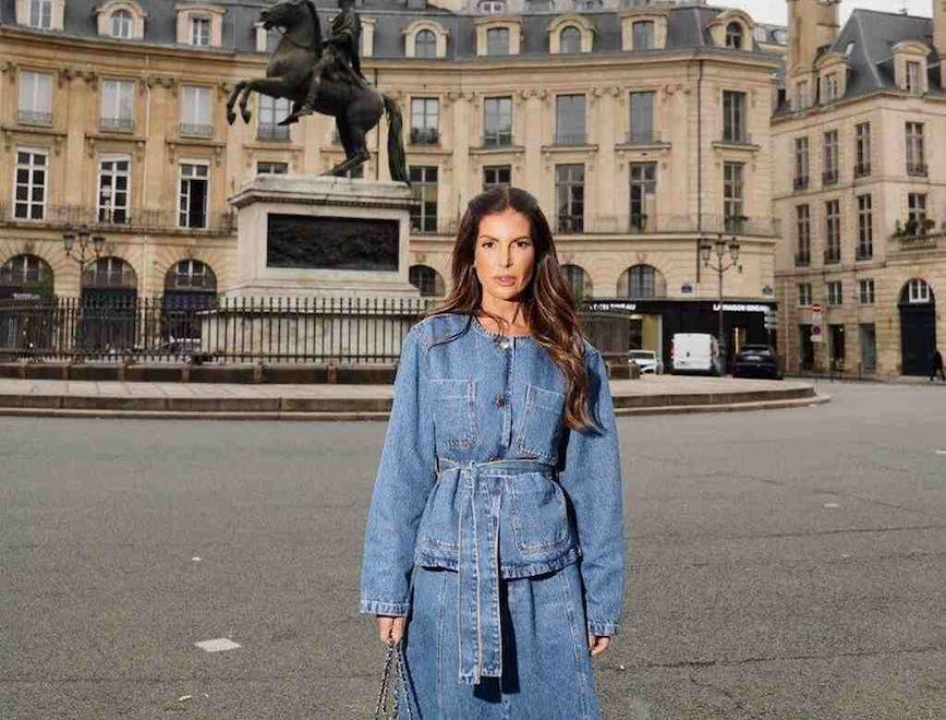 pants coat jeans person standing adult female woman handbag lady