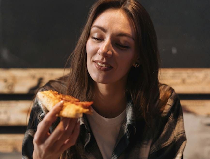 adult female person woman eating food face head pizza