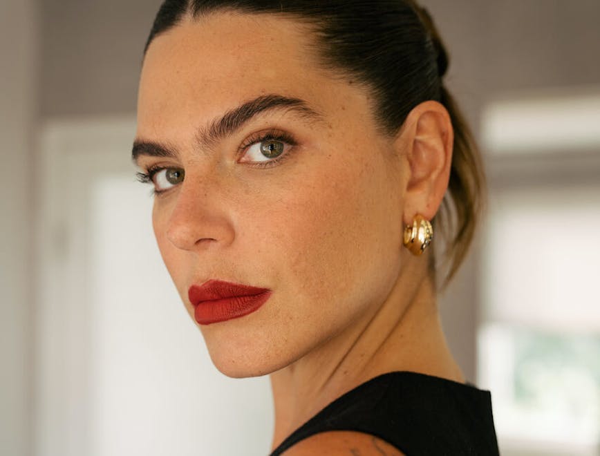 face head person portrait accessories earring adult female woman lipstick
