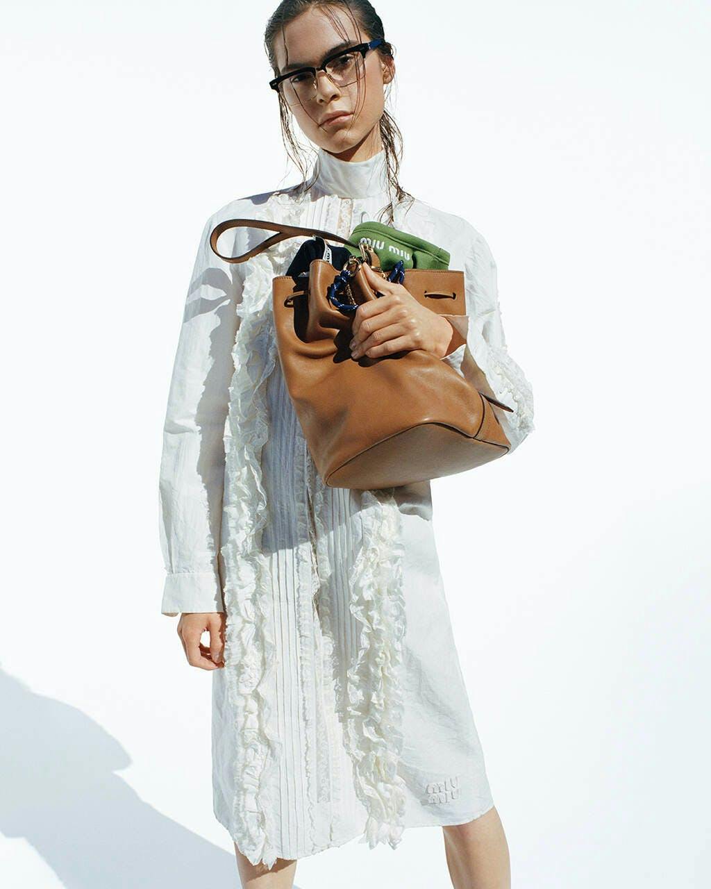 accessories bag handbag coat purse long sleeve adult female person woman