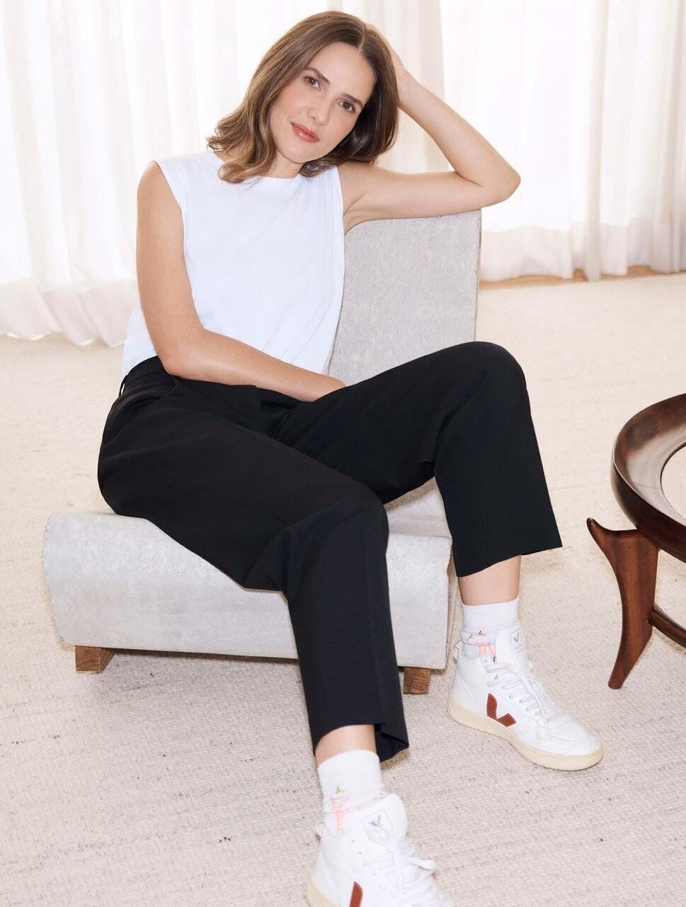 person sitting female girl teen clothing pants